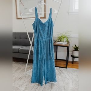 Blue Polkadot jumpsuit with open back tie and sweat heart neckline